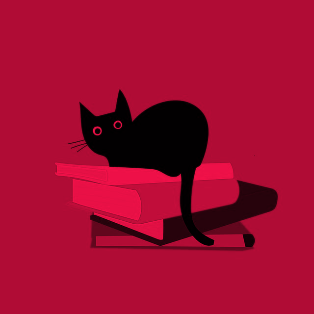  cat on books.png